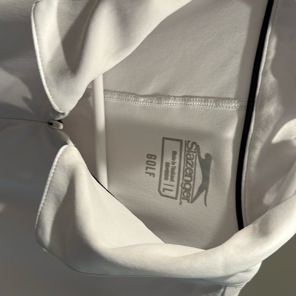 White Slazenger golf top